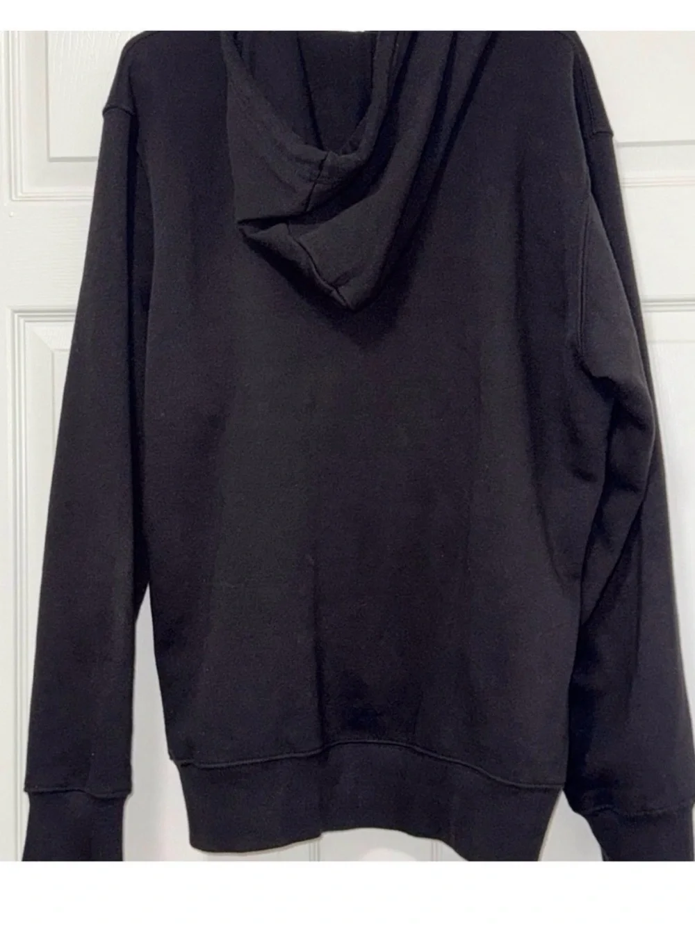 The North Face Black Pullover Hoodie with Blue Logo and Orange Accents